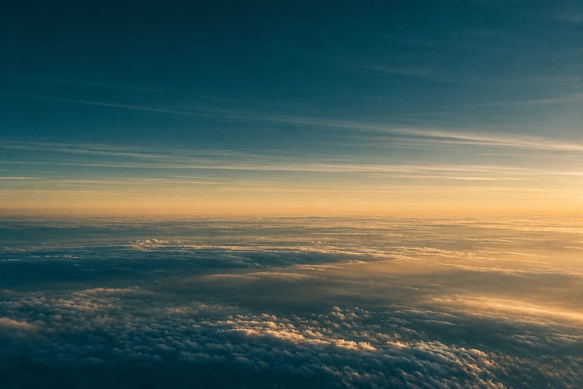 Abstract aerial view of layered atmospheric strata over the horizon